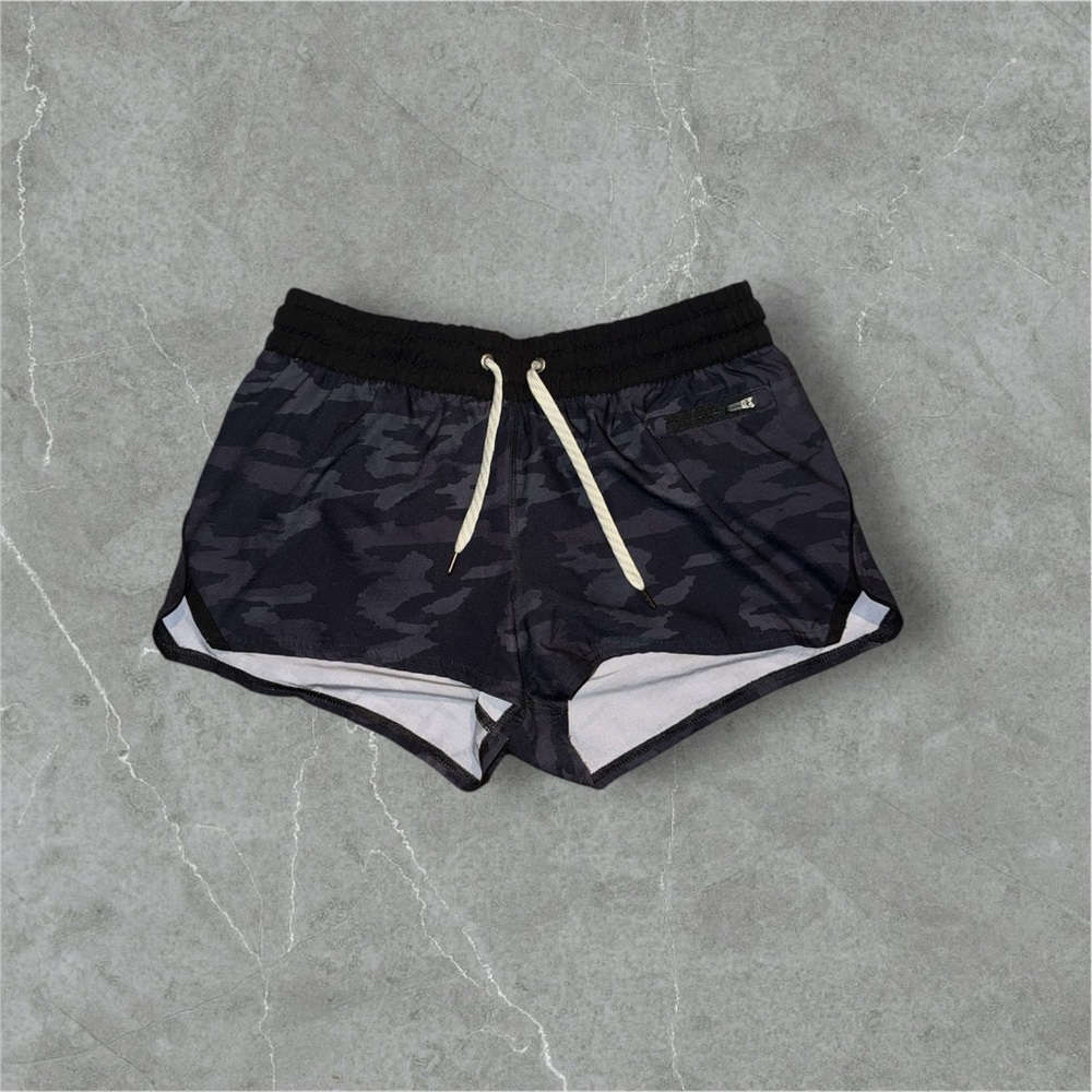 Vuori Clementine shorts in a black camouflage pattern